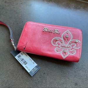 Miss Me brand zippered wallet style clutch. New with tag. Has rhinestones/bling.